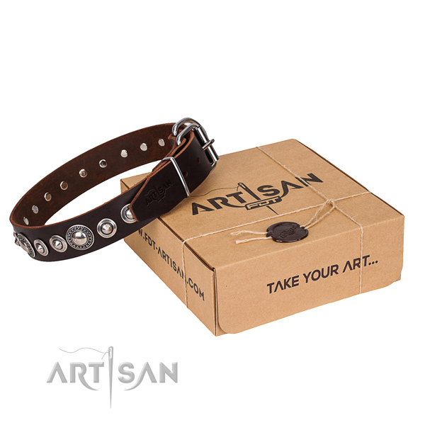 Leather dog collar made of soft to touch material with rust resistant traditional buckle