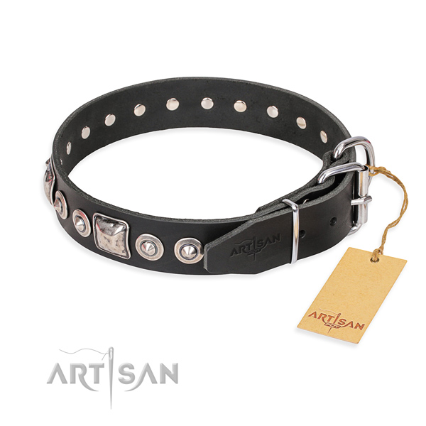 Leather dog collar made of flexible material with rust resistant embellishments